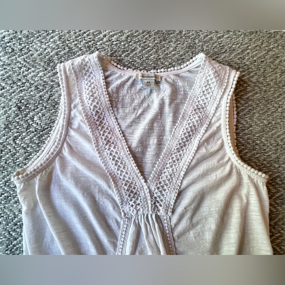 Sundance V-neck shirt with stylish embellishments.